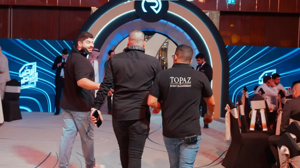 Topaz Events crew guiding guests through the LED tunnel at the Al Rasikhoon Real Estate launch 2025