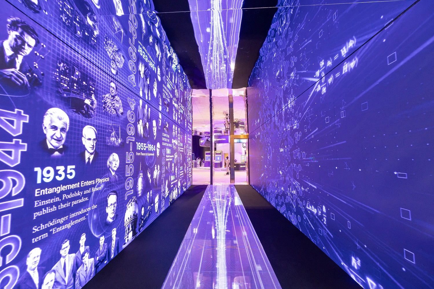 Immersive LED tunnel for the Technology Innovation Institute showing a timeline of physics and famous scientists