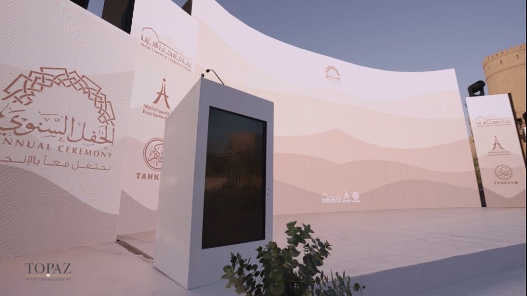Annual Ceremony branded stage backdrop and LED podium at the Sharjah Chamber of Commerce & Industry event 2024