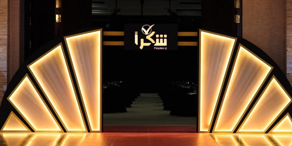 Illuminated fan-shaped Shukran entrance gateway at the Shukran Annual Ceremony 2024 by Topaz Events