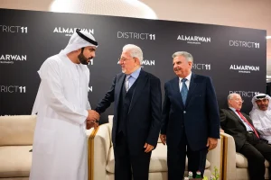 Owner of Al Marwan Developments shaking hands with an Emirati VIP guest during the District 11 Property Launch, a real estate launch event organized by Topaz Events.