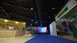 High-definition immersive LED screens displaying classic car visuals during a corporate event at the Sharjah Museum.