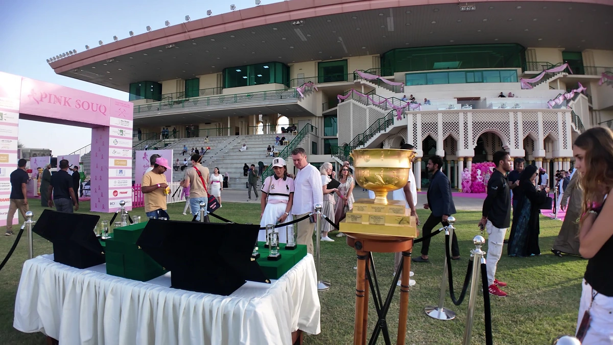Close-up of pink-themed refreshments and gourmet appetizers served during the Ghantoot Polo event.