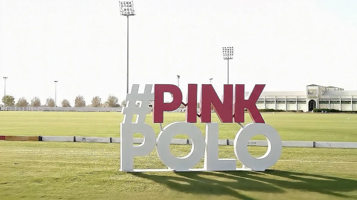 Official Pink Polo 2025 event logo signage at Ghantoot Racing & Polo Club, representing breast cancer awareness and sporting excellence.