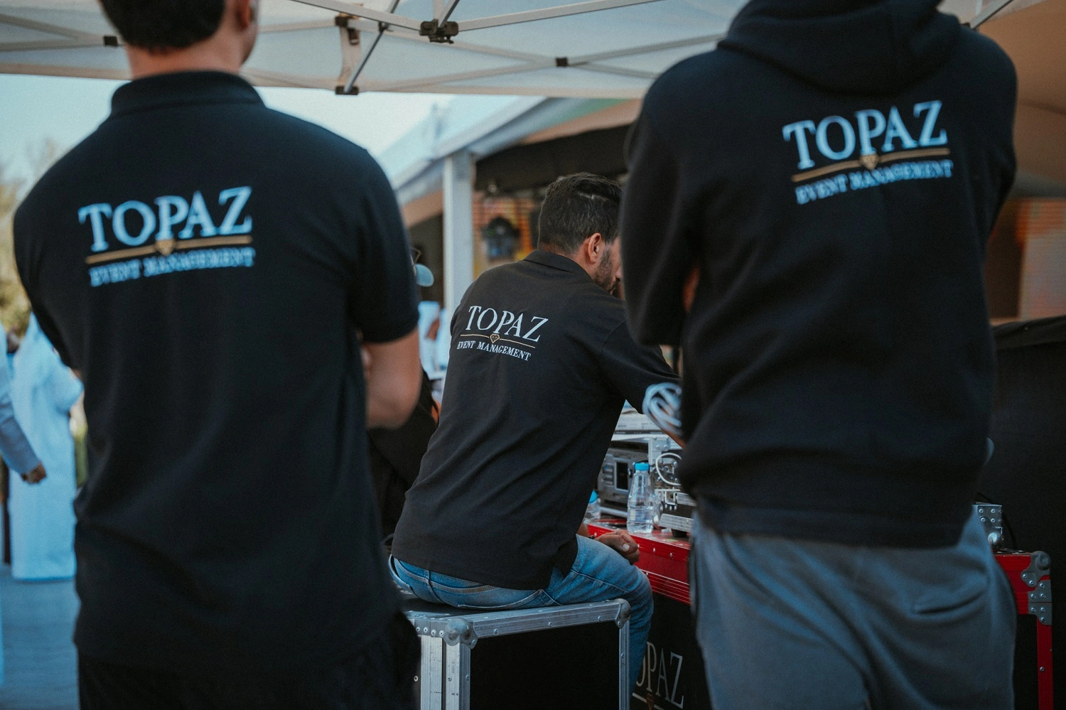 Topaz Events organizing the 54th UAE National Day celebration for Sharjah Asset Management, featuring patriotic décor, stage setup, LED screens, and cultural performances.