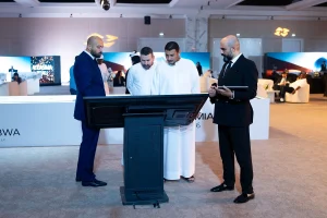 Live sand art performance using tangible interactive table technology at real estate launch