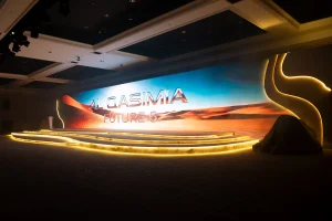 Main indoor stage design featuring massive high-definition LED backdrops and custom lighting.