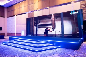 Event stage setup with dynamic lighting and presentation area by Topaz Events at LAHAB corporate event.