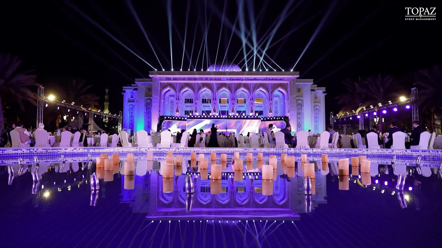 Premium stage production with lighting and LED visuals at American University of Sharjah alumni event.
