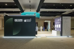 A branded video wall at the SNOC exhibition stand during HSE Expo 2026, Al Jawaher, Sharjah — showcasing high-impact visual content aligned with SNOC's identity and the event's HSE theme of Resilience, Sustainability & Operational Excellence, installed and managed by Topaz Events.