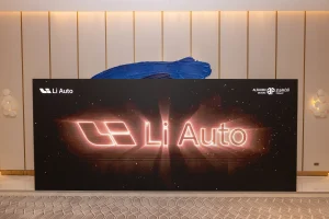 Large LED screens featuring Li L9 branding at the car launch event in Dubai by Topaz Events