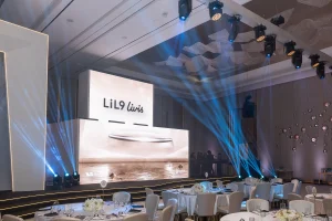 Large branded LED stage with luxury furniture at the Li Auto L9 launch event in Dubai by Topaz Events