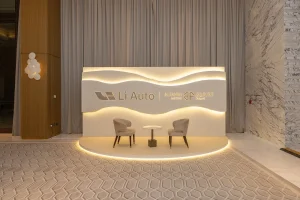 Discussion panel stage with branded LED screen backdrop at the Li Auto L9 launch event in Dubai by Topaz Events