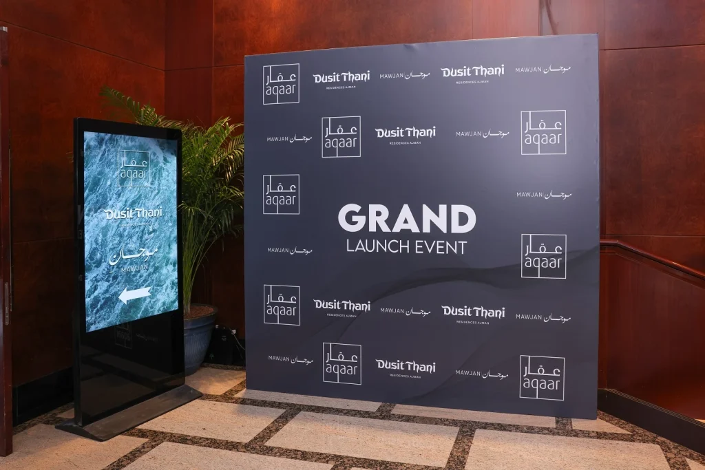 Grand Launch Event welcome backdrop and digital signage at the Aqaar event entrance