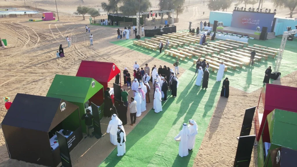 Officials touring the exhibition booths at Aisha Oasis for Innovation 2026, Sharjah