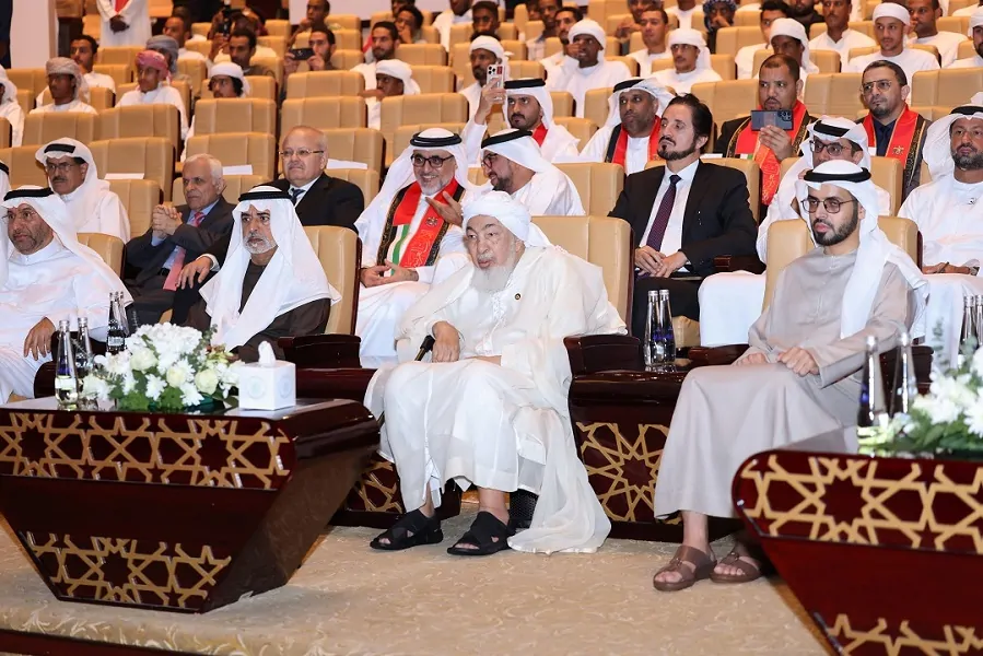 Dignitaries and guests seated in the front rows at the Abu Dhabi Forum for Peace celebration, Abu Dhabi National Theater