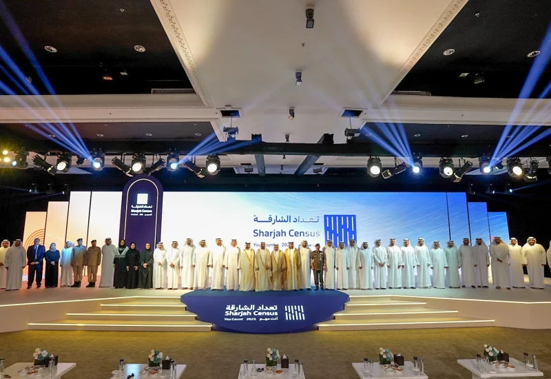 Group photo of government officials, VIP guests, and event leaders on stage at the 2025 Sharjah Census Reveal by Topaz Events, held at Al Jawaher Reception and Convention Centre, Sharjah.